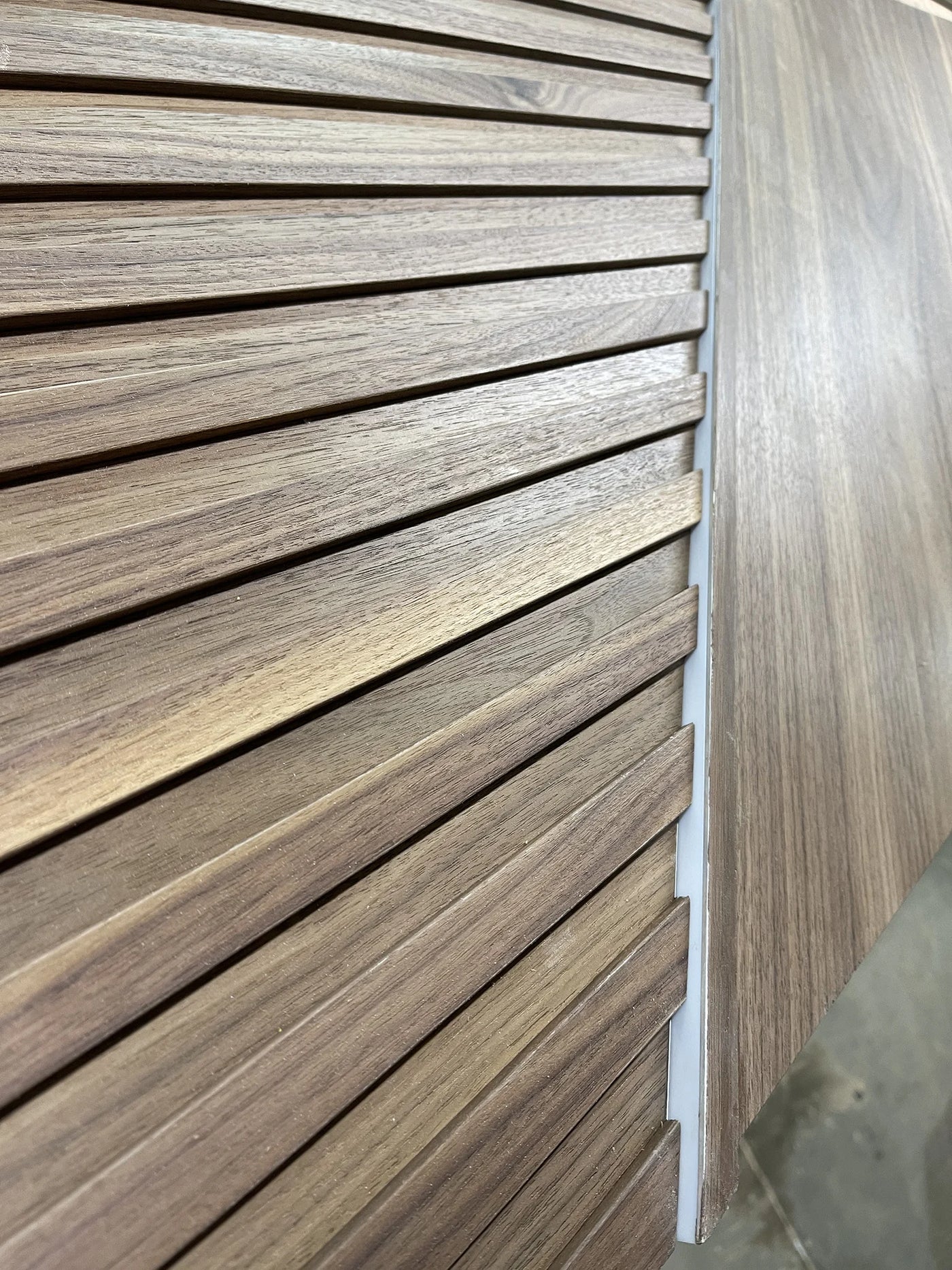 Walnut Panels with Backlit Slat Inserts
