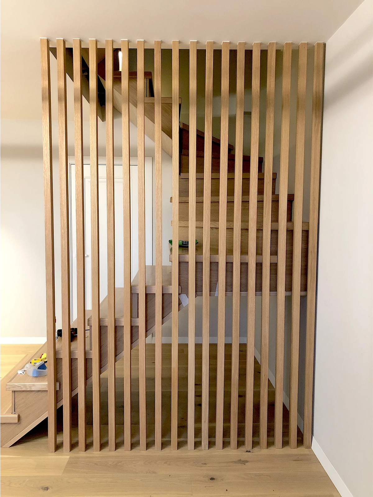 Oak Slat Partition for a Staircase