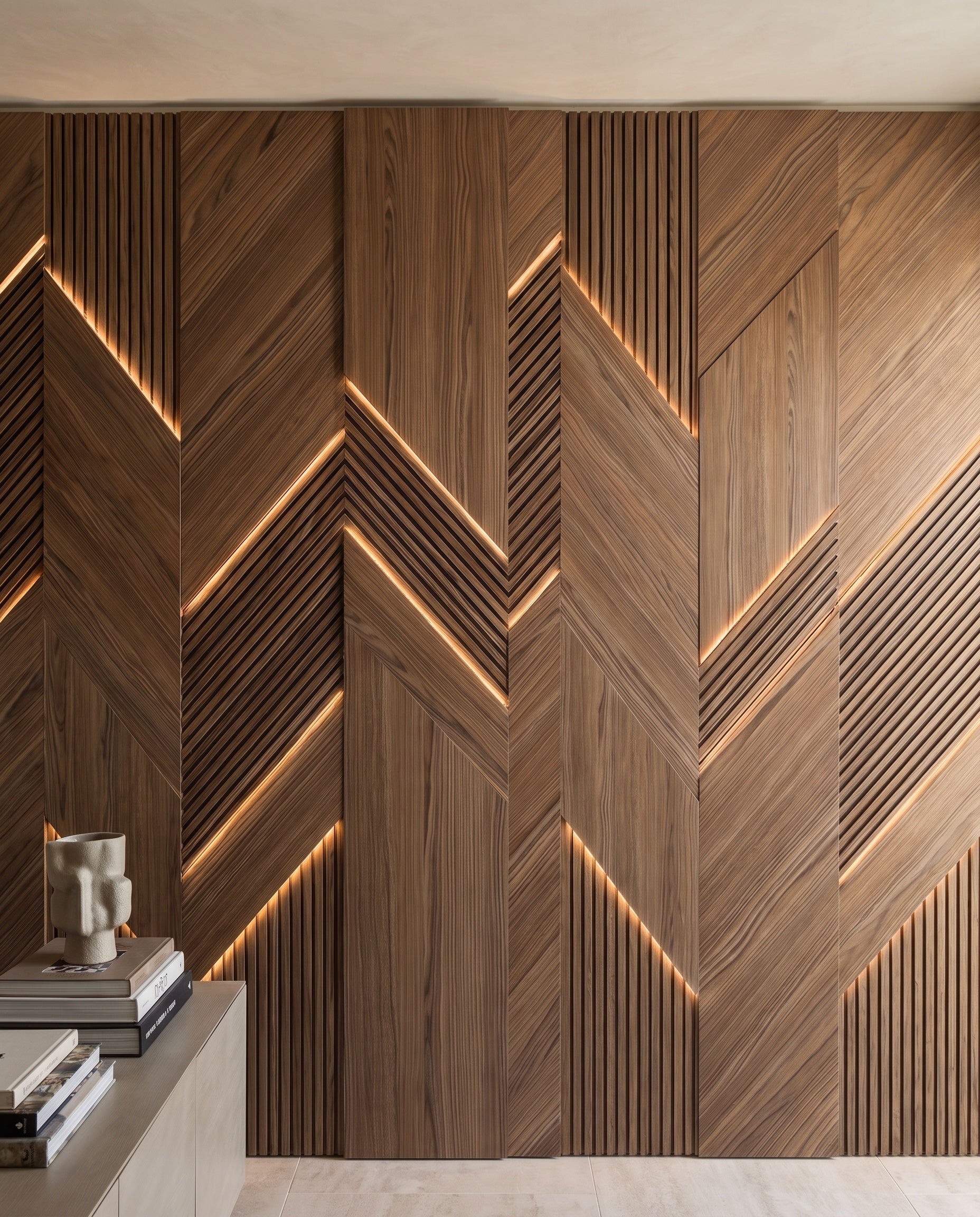 Close construction and material detail of Illuminated Chevron Wood Wall Panels