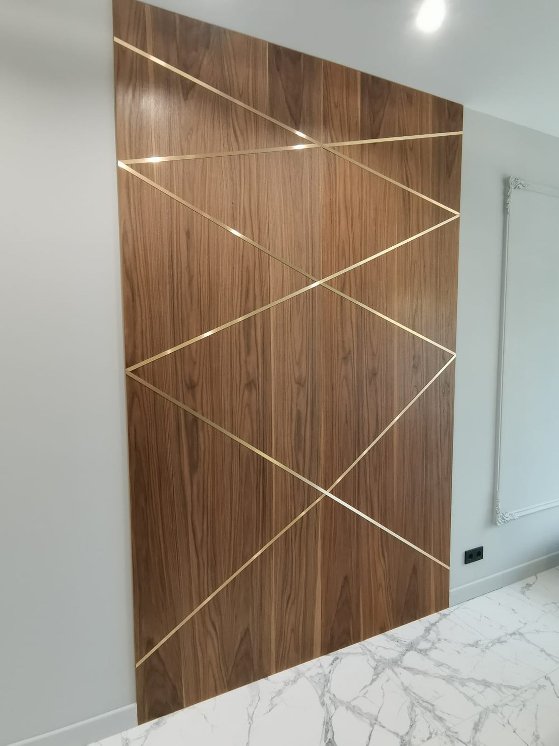 WALNUT PANELS WITH BRASS STRIPS