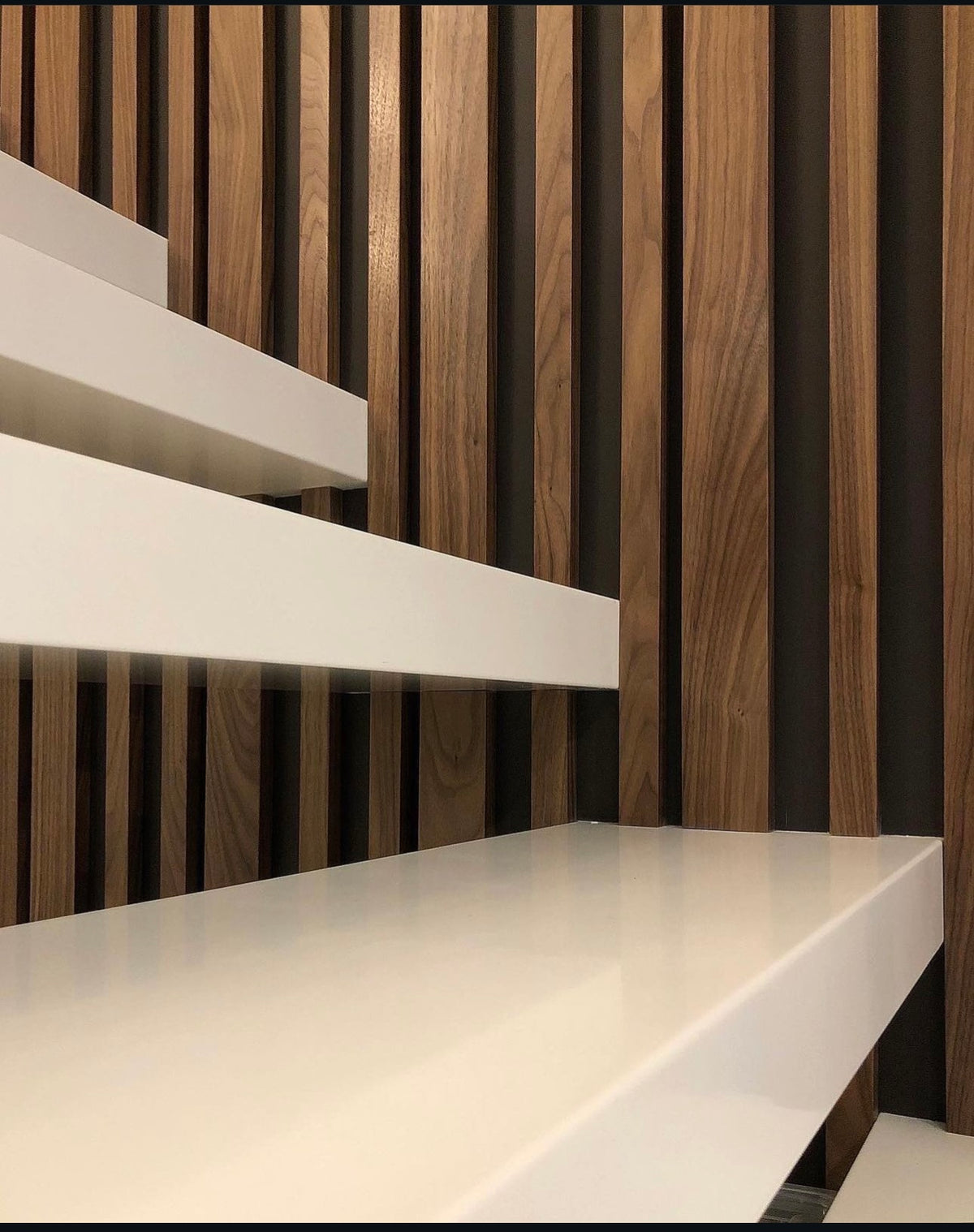 Mixed Width Slat Wall for a Staircase