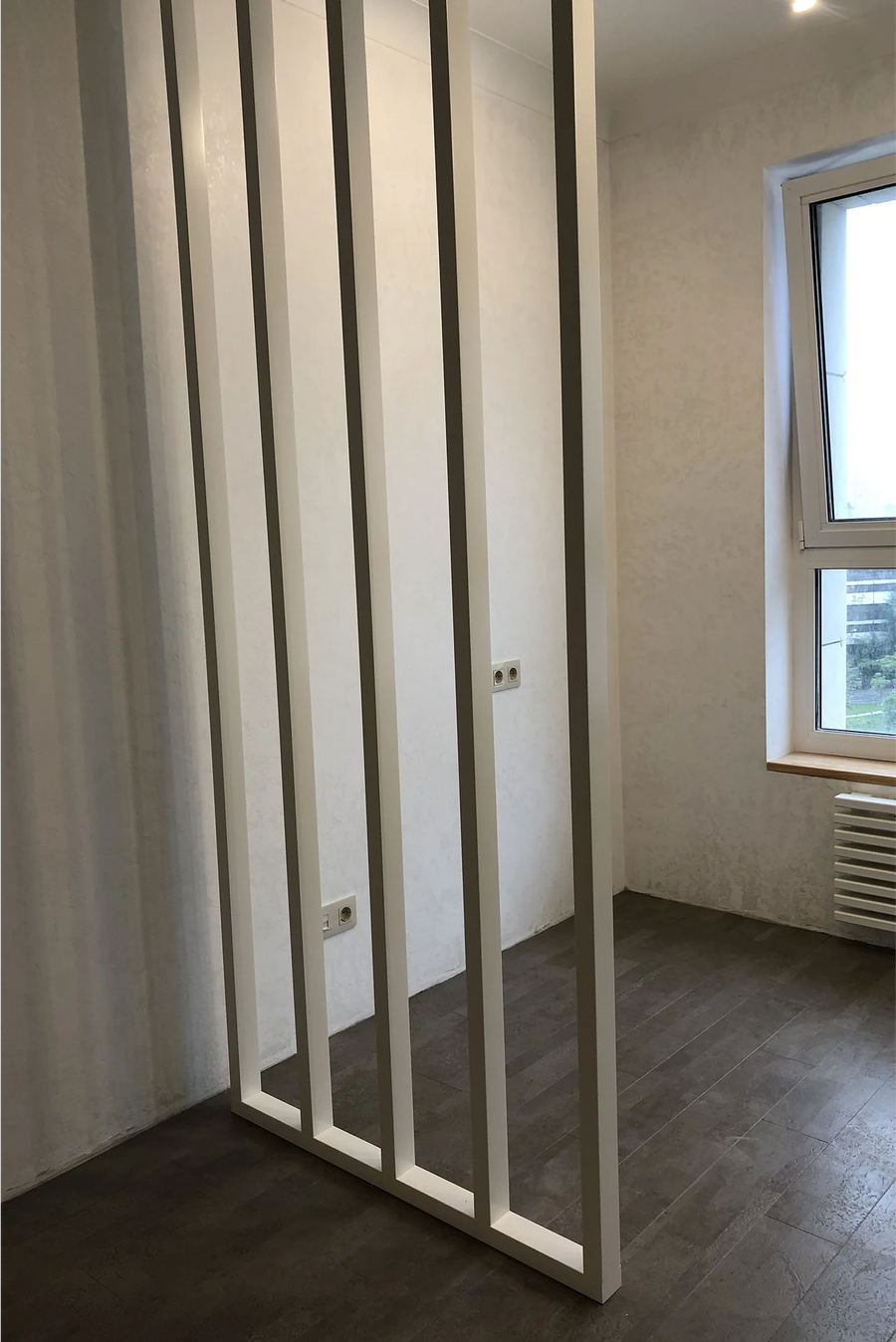 Partition, Slat Ceiling and Wall Panels in an Apartment