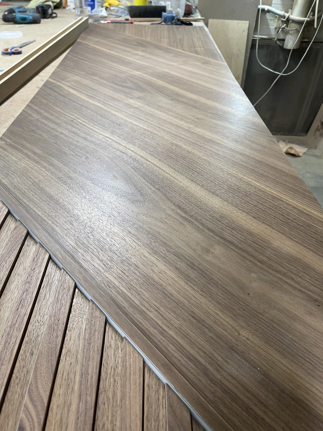 WALNUT PANELS INSIDE SLATS AND LIGHT