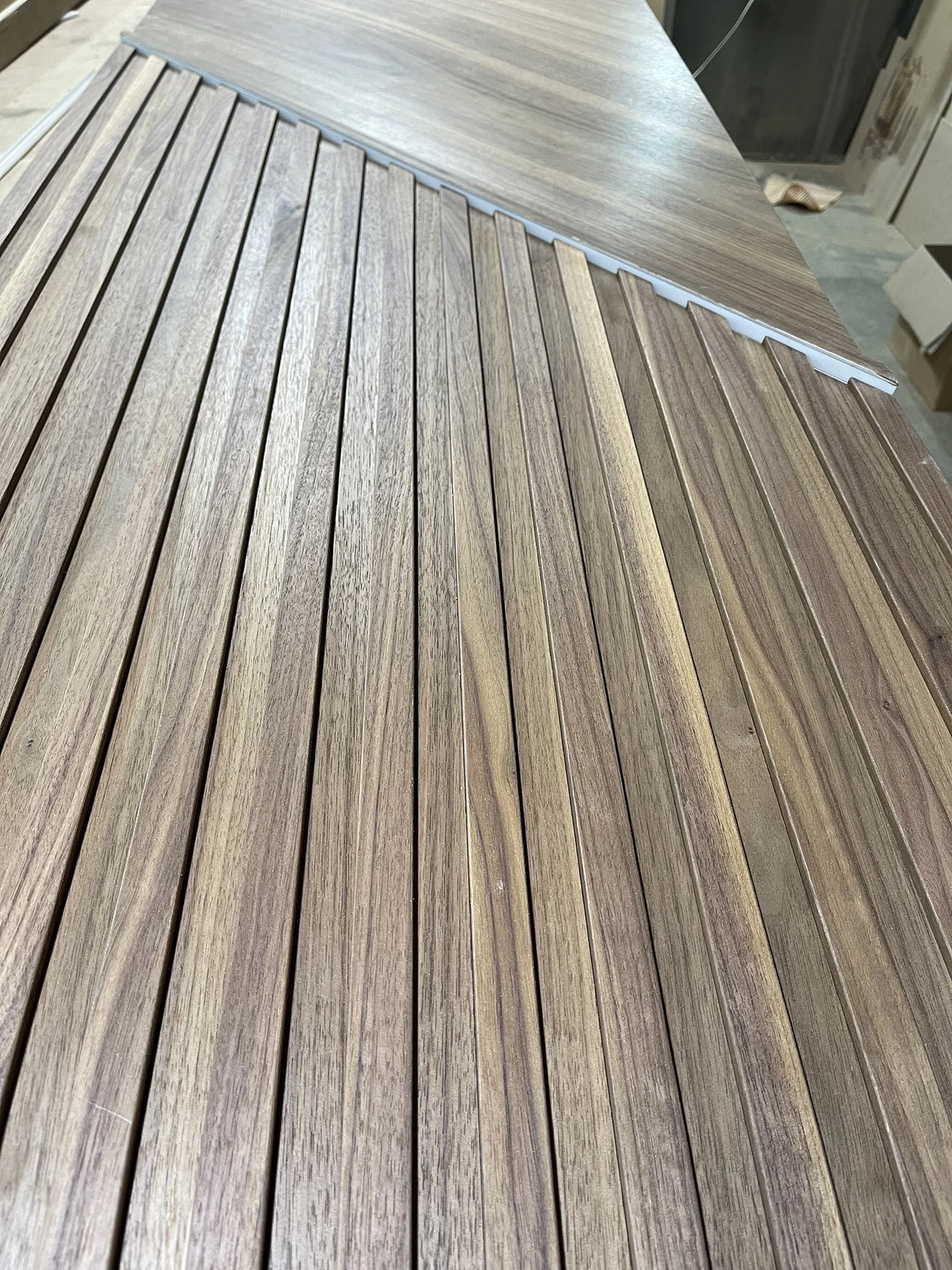 Walnut Panels with Backlit Slat Inserts