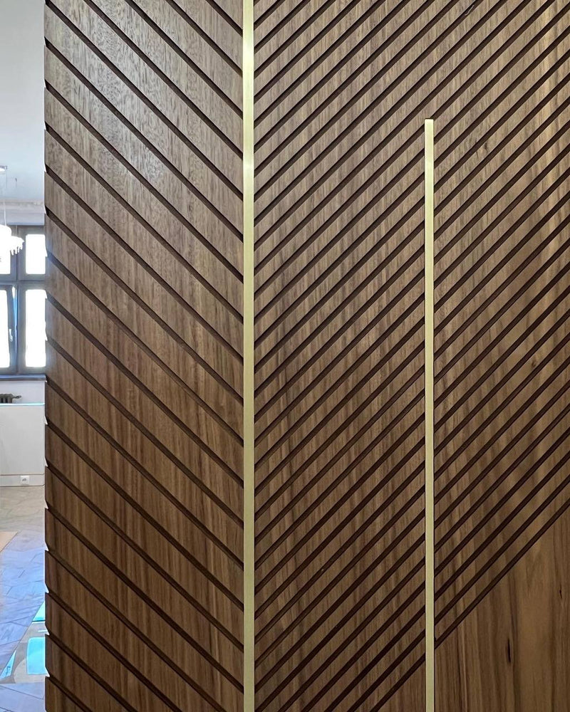 LUXURY WALNUT PANELS WITH DESIGN BRASS