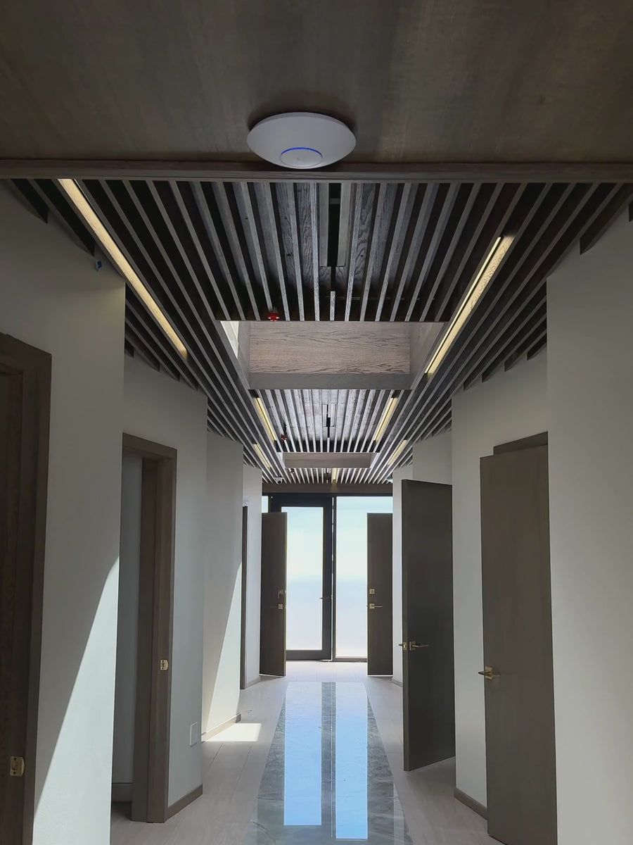 Slat Ceiling, Panels and Lighting for a Clinic