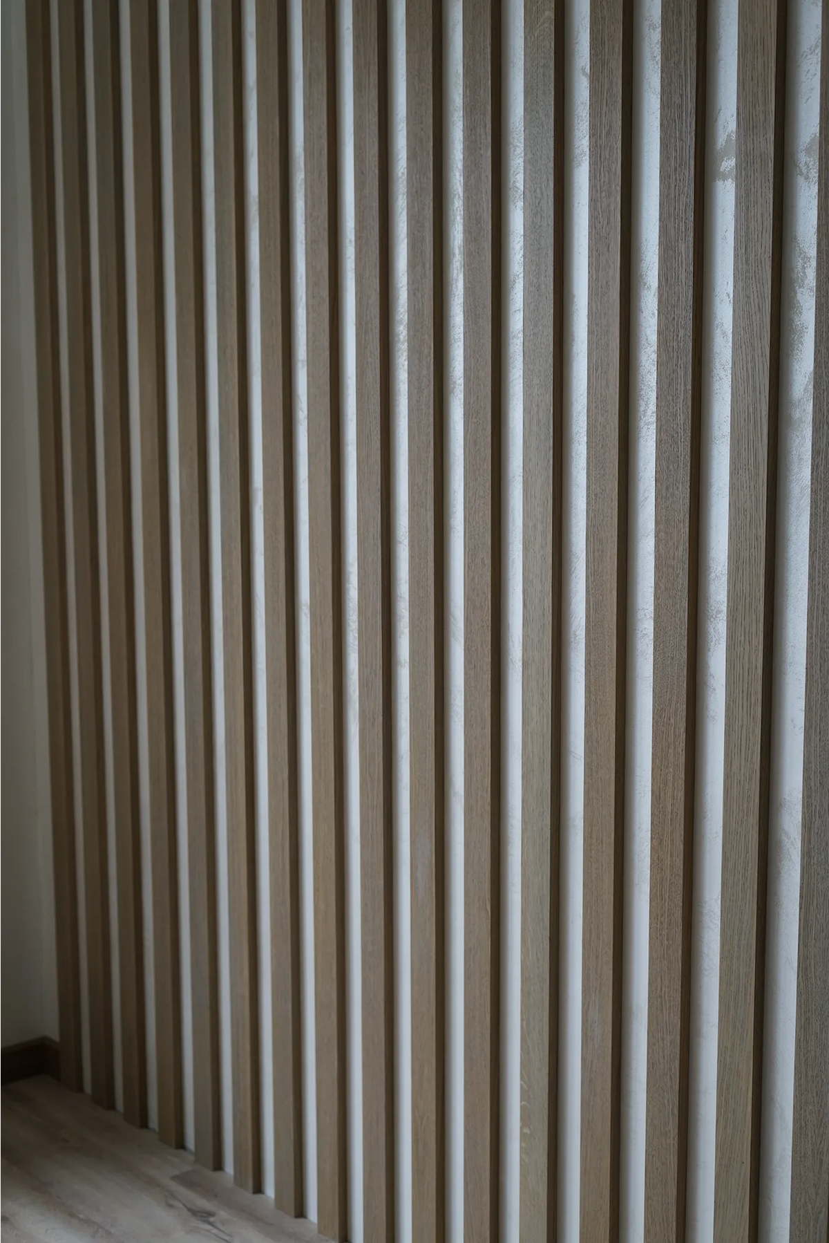 Partition, Slat Ceiling and Wall Panels in an Apartment
