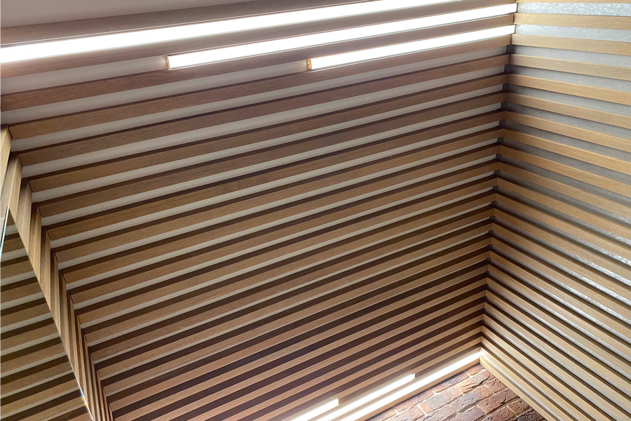 Partition, Slat Ceiling and Wall Panels in an Apartment
