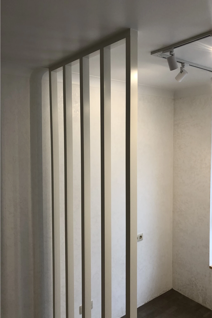 Partition, Slat Ceiling and Wall Panels in an Apartment