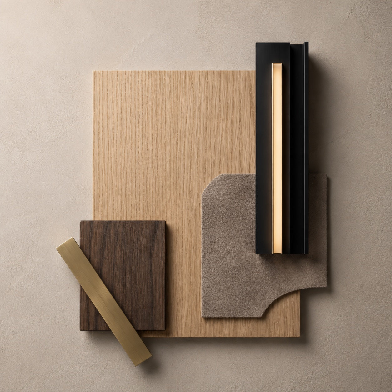 White oak veneer material study with smoked walnut, taupe Alcantara, brushed brass and an illuminated black profile